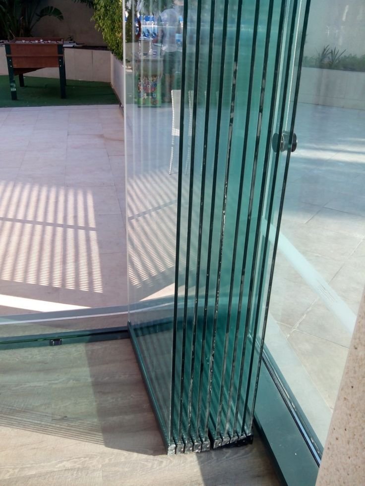 Frameless Bifold Glass Doors.