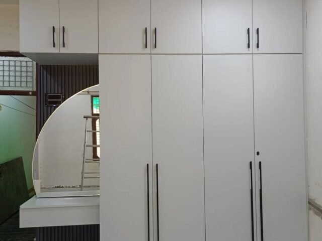 Bedroom wardrobes in Kenya, modern bedroom wardrobes, sliding door wardrobes Kenya, custom bedroom wardrobes, wooden wardrobes in Kenya, wardrobe installation Kenya, walk-in closets Kenya, small bedroom wardrobe solutions, bedroom interior design Kenya, SUIMAS wardrobes.