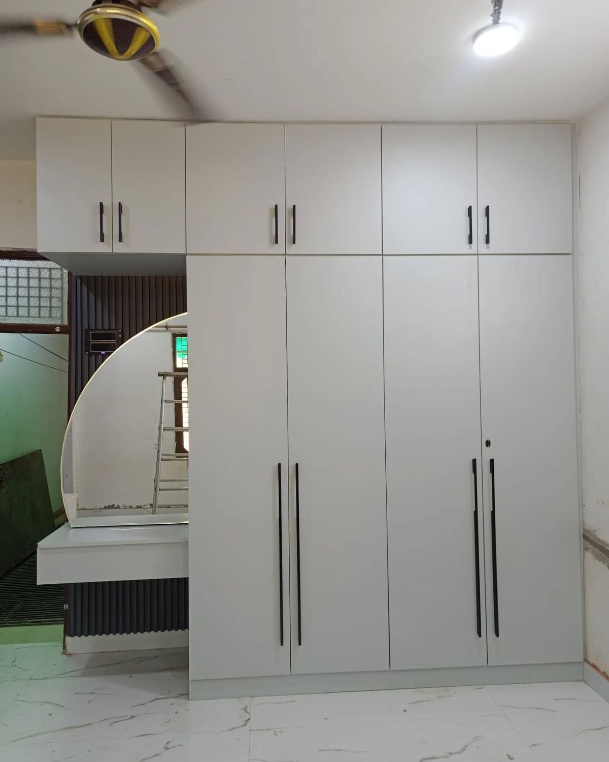 Bedroom wardrobes in Kenya, modern bedroom wardrobes, sliding door wardrobes Kenya, custom bedroom wardrobes, wooden wardrobes in Kenya, wardrobe installation Kenya, walk-in closets Kenya, small bedroom wardrobe solutions, bedroom interior design Kenya, SUIMAS wardrobes.