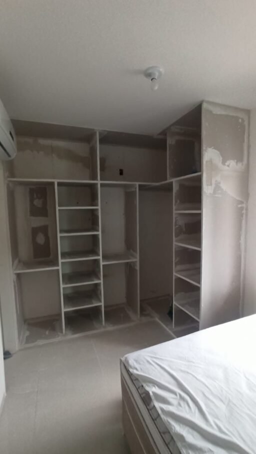 bedroom walk-in closets in Kenya, modern walk-in closet designs, small bedroom closet solutions, large walk-in closet Kenya, custom walk-in closets Kenya, wooden walk-in closets, sliding door closets, closet installation services Kenya