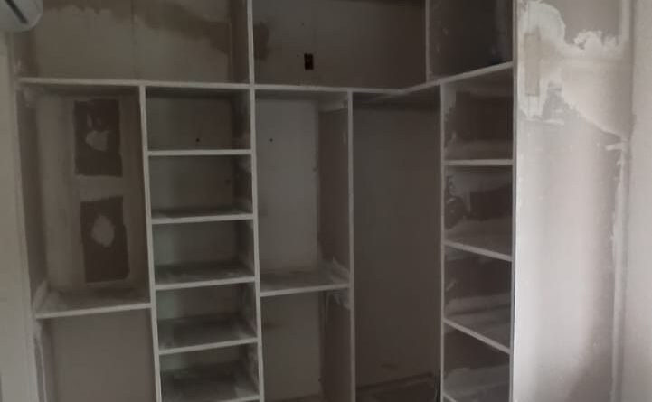 bedroom walk-in closets in Kenya, modern walk-in closet designs, small bedroom closet solutions, large walk-in closet Kenya, custom walk-in closets Kenya, wooden walk-in closets, sliding door closets, closet installation services Kenya