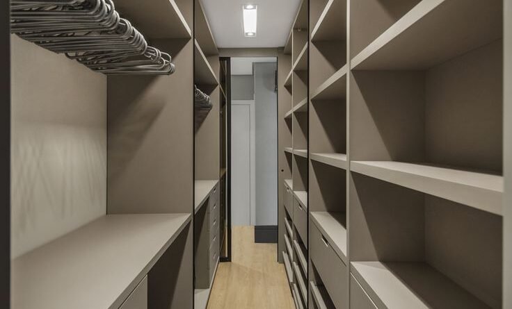 Large walk-in closet designs in Kenya, modern walk-in closets, wooden walk-in closets, sliding door walk-in closets, bedroom closet designs, custom walk-in closets Kenya, walk-in closet installation services, SUIMAS walk-in closets.