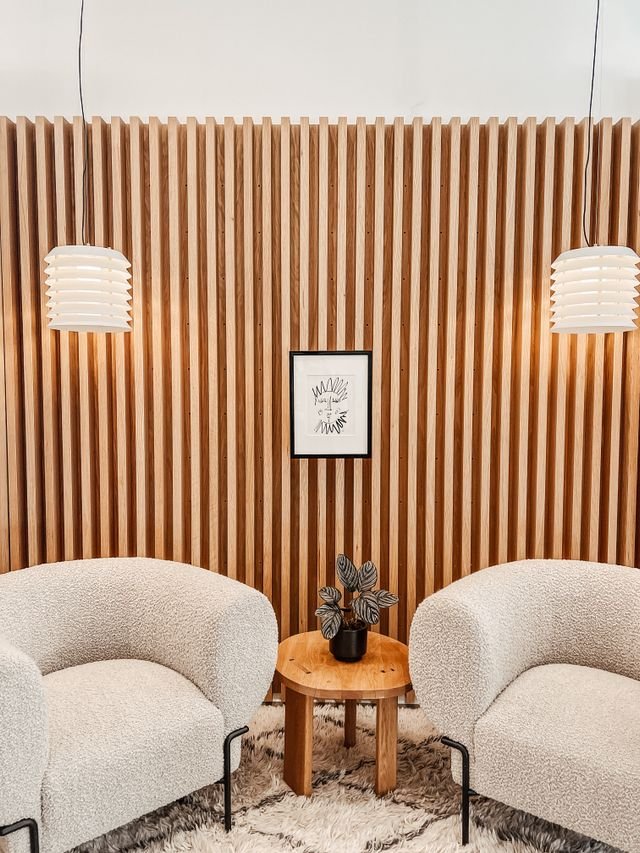 Suimas Interiors vertical fluted panels installation for office reception Nairobi